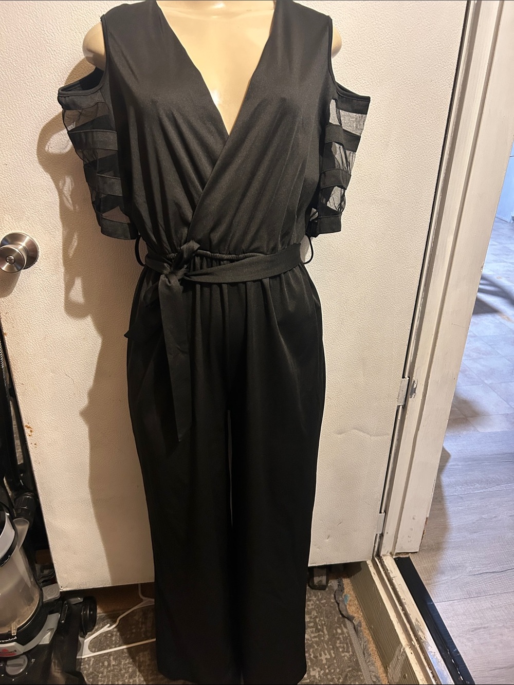 Black Cold-Shoulder Wrap Jumpsuit with Tie Waist and Mesh Sleeve Detail